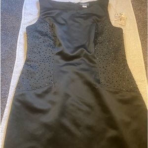 Women’s elegant dress with gems. Sleeveless satin base with a small back slip